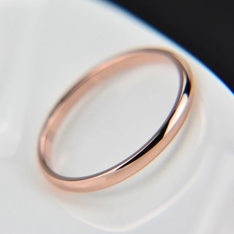 Elegant one-piece unisex ring with a thin 2mm band in four stylish colours: silver, gold, rose gold, and black