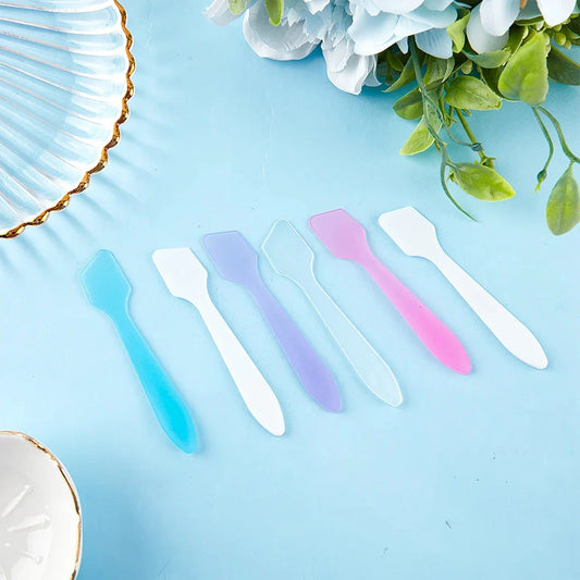 10 Pcs Mini Cosmetic Spatulas in various colours for precise application of face creams and masks