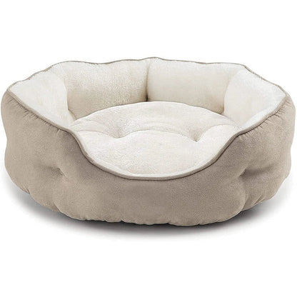 Cozy round small pet bed in beige color with soft microfiber fleece material and non-slip bottom