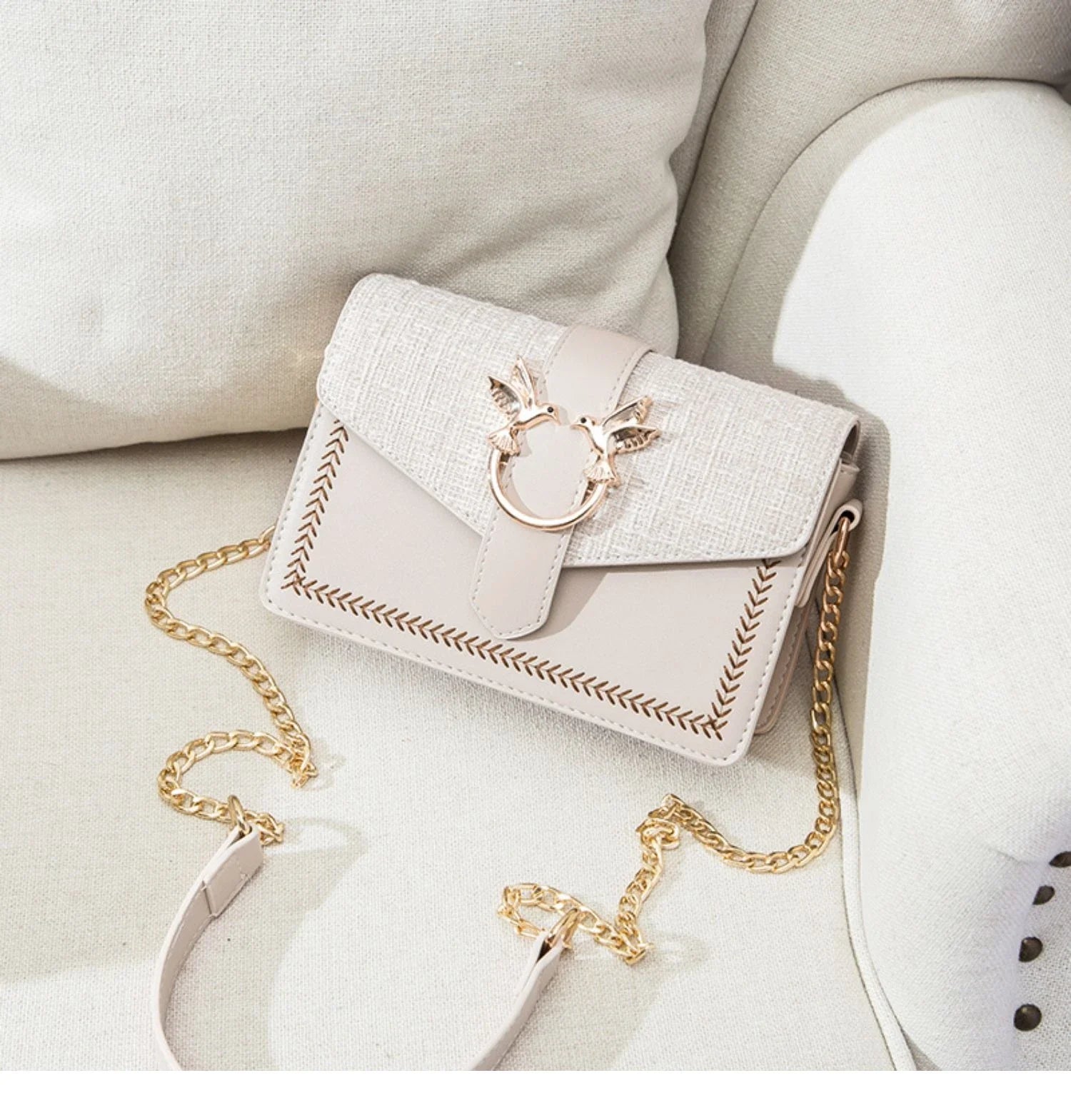 Elegant ladies chain shoulder bag made of premium artificial leather with a fashionable chain strap, perfect for Kiwi women.