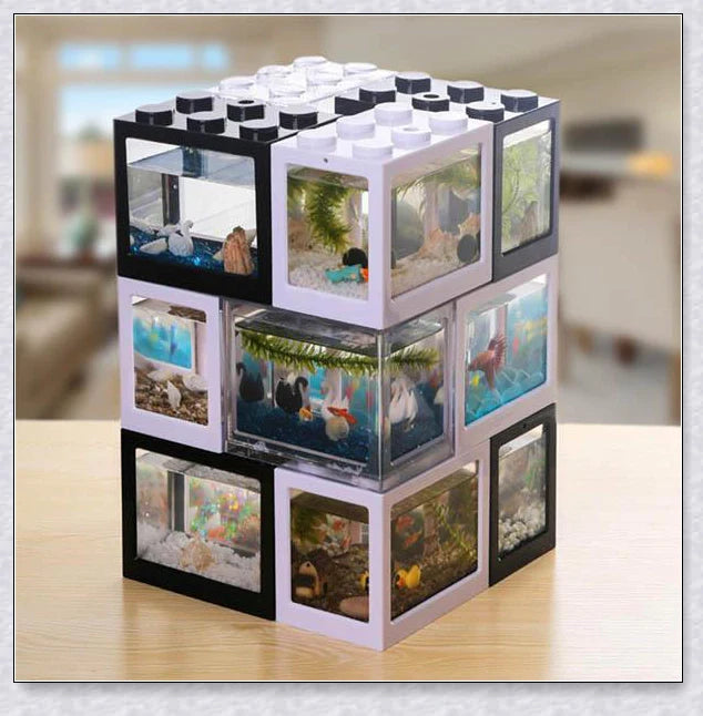 Stackable InspireHOME Mini Block Aquarium with LED lighting, showcasing various color options and configuration possibilities