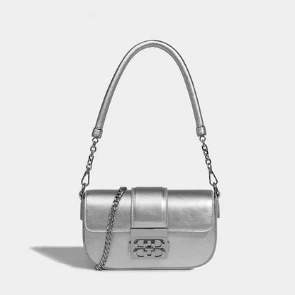 Elegant silver shoulder and crossbody bag for women, featuring a flap design and adjustable straps for versatile use