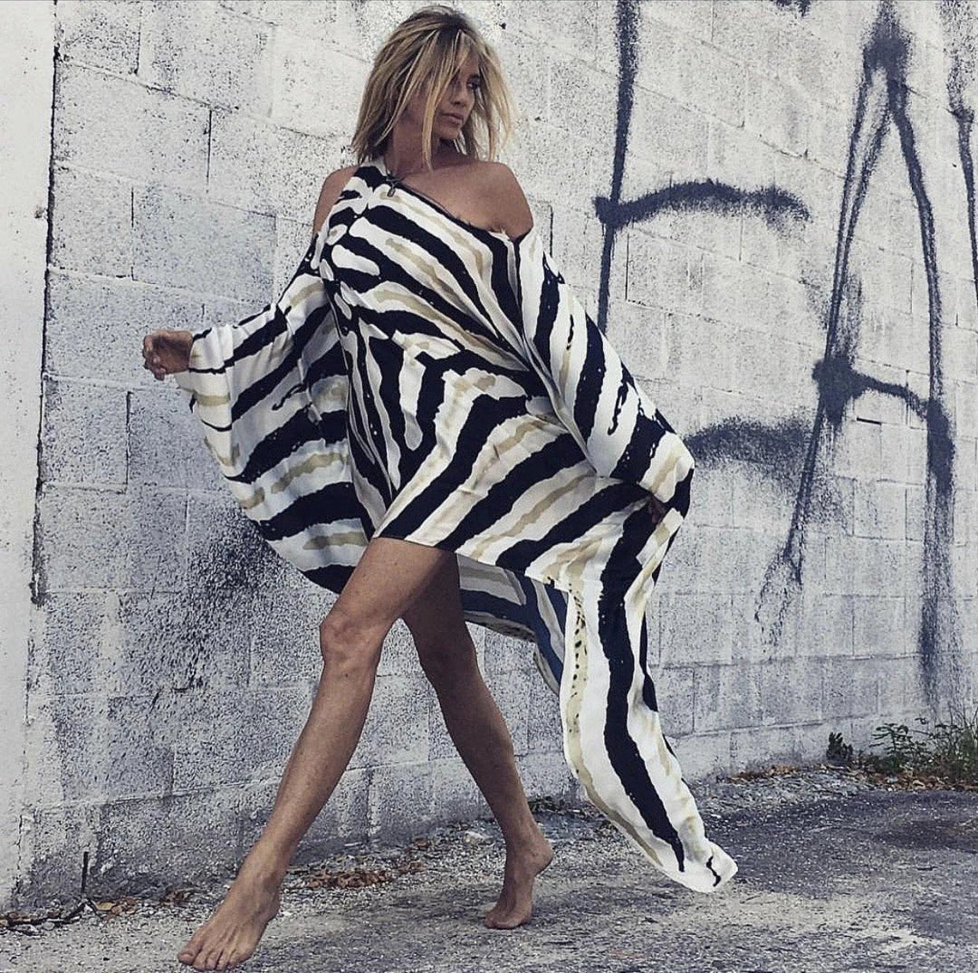 Stylish inclined shoulder printed dress set with a flowing, large swing-style skirt and vibrant patterns