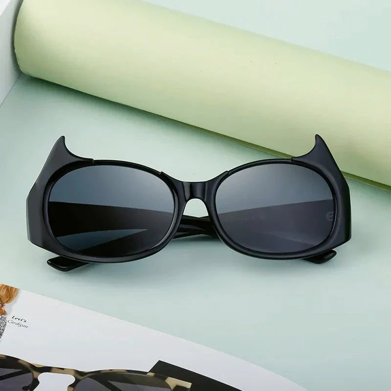 Stylish cat-eye luxury sunglasses with oversized frames and semi-rimless design in a leopard gray color