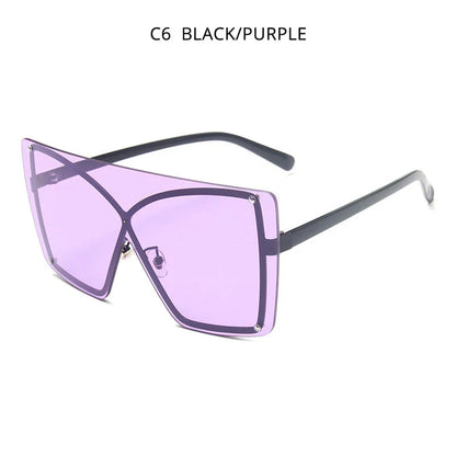 Fashionable Oversized Flat Top Sunglasses with a sleek, rimless design and gradient lenses for style and UV protection