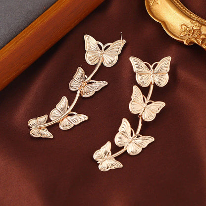 Elegant bohemian-inspired butterfly drop earrings made with premium New Zealand materials for a stylish and enchanting accessory