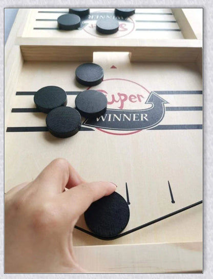 A hand-crafted wooden hockey game with rubber band-powered pucks, perfect for family bonding and screen-free fun in New Zealand