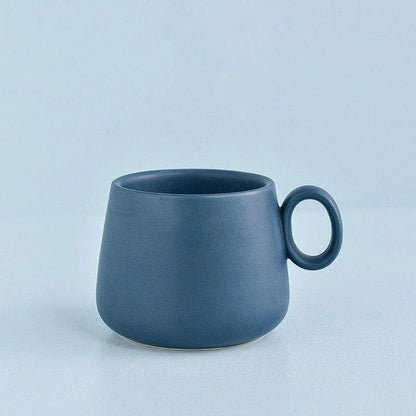 Pastel green ceramic coffee mug with a Kiwiana-inspired design, perfect for daily use in New Zealand homes and cafes.