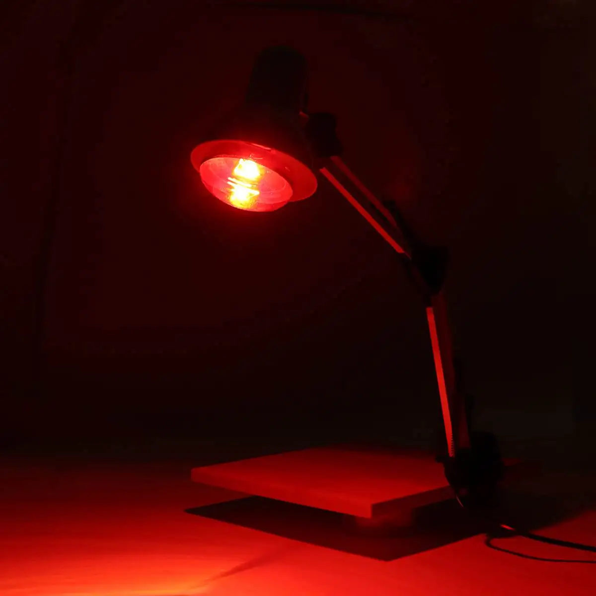 A therapeutic infrared lamp with a light bulb, designed to provide natural health benefits through infrared light technology.