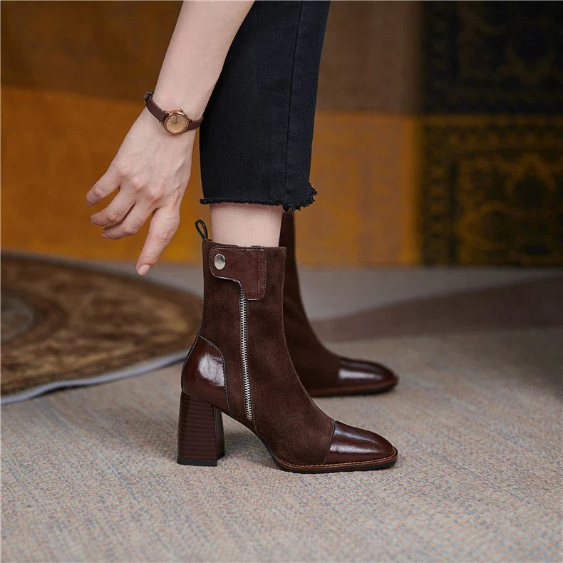 Stylish high-heel Martin boots in brown and black colours, featuring a square toe and side zipper closure for a secure, comfortable fit.