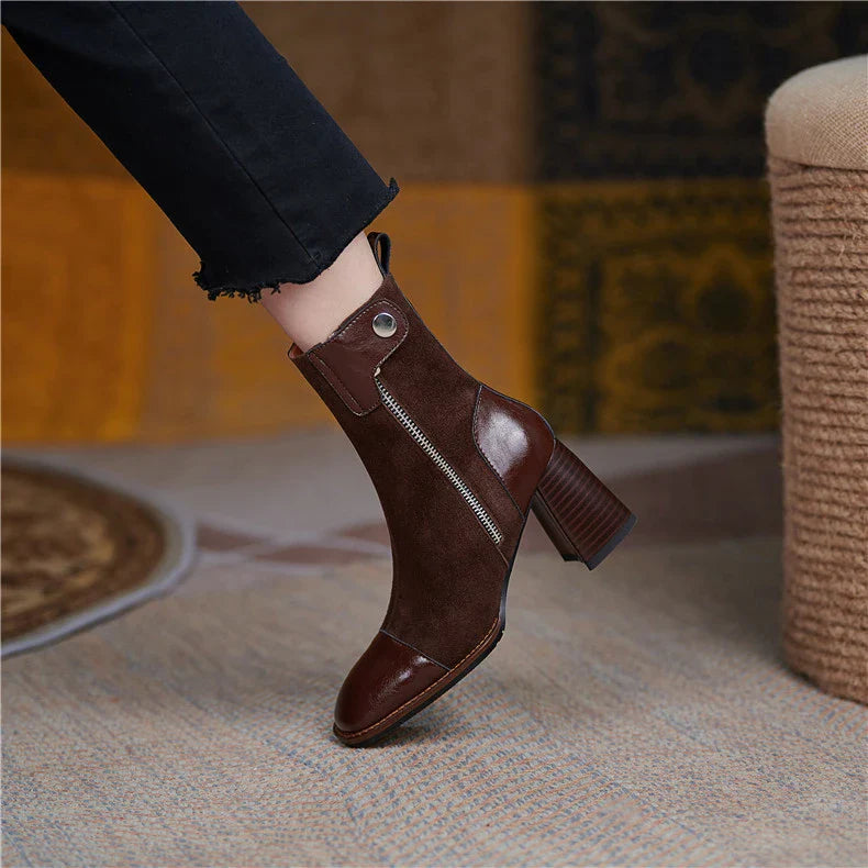 Stylish high-heel Martin boots in brown and black colours, featuring a square toe and side zipper closure for a secure, comfortable fit.