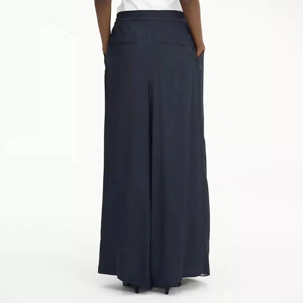 Stylish navy high-waist wide-leg pants with unique patchwork design for the fashion-forward Kiwi woman