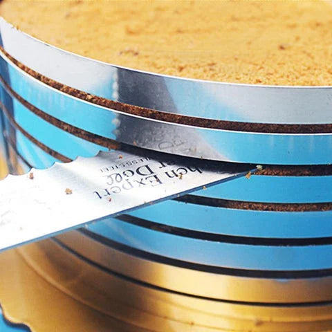 An adjustable stainless steel cake slicer with a ring that can be expanded or shrunk to fit cakes of different sizes, up to 12 inches in diameter.