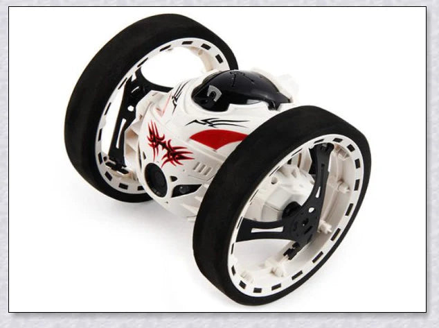 Mini 2.4GHz remote control bounce car in red and white, capable of jumping up to 31.5 inches high and performing stunts like 360-degree spins