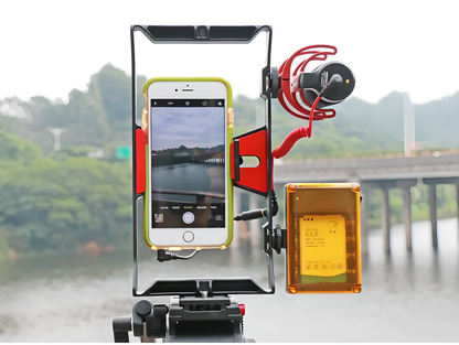 Smartphone video rig with accessories like LED light and microphone, providing stable and professional-grade filming capabilities