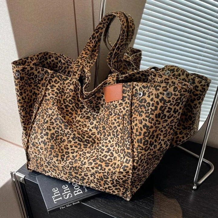 Oversized leopard print canvas shoulder bag with ample storage and stylish design, perfect for Kiwi women