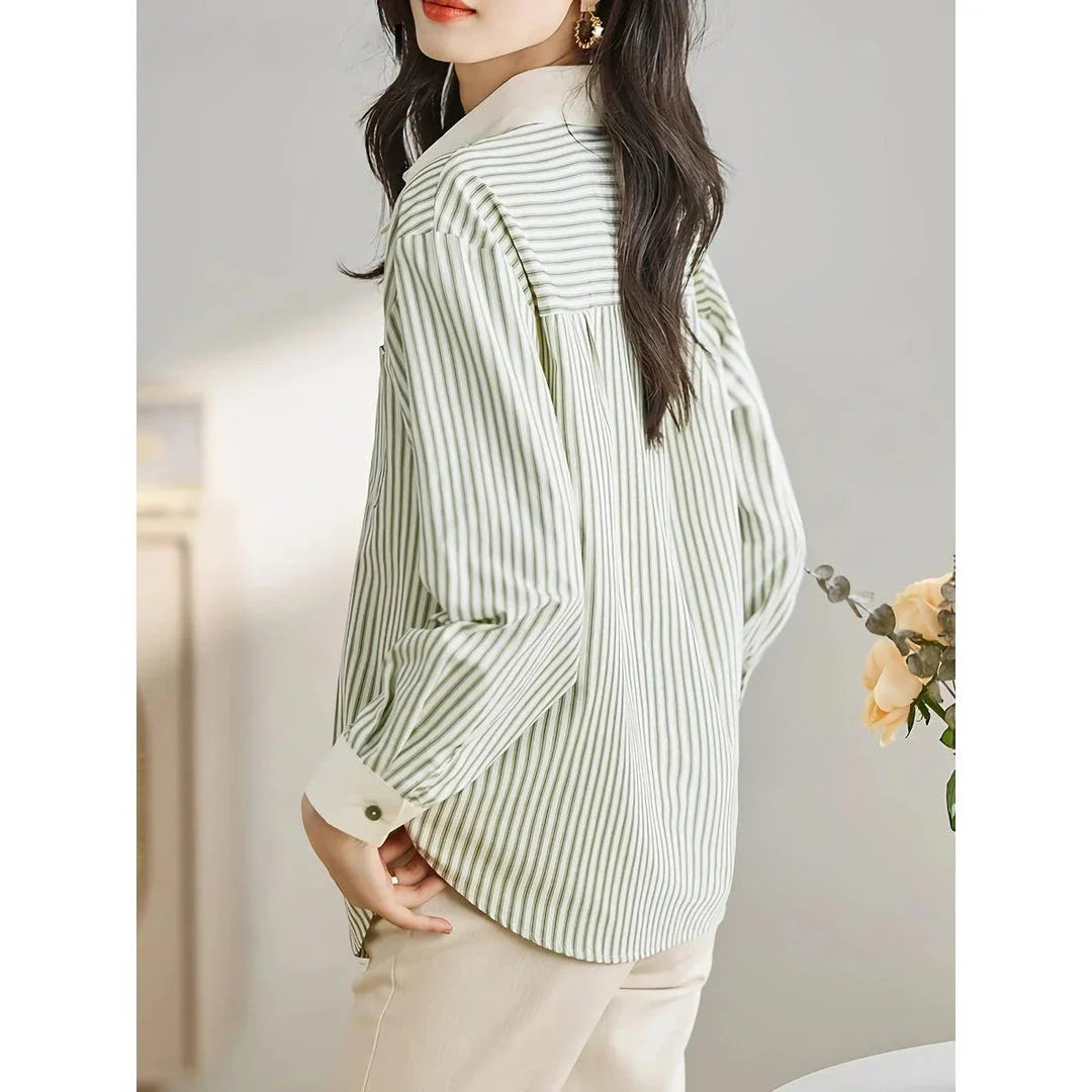 Stylish green striped chiffon blouse for women, featuring a classic striped pattern, turn-down collar, and flowing, comfortable fit.