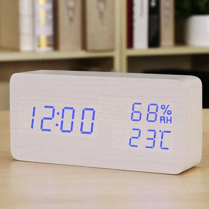 Wooden, luminous, and silent alarm clock with humidity monitoring and temperature display for baby's room