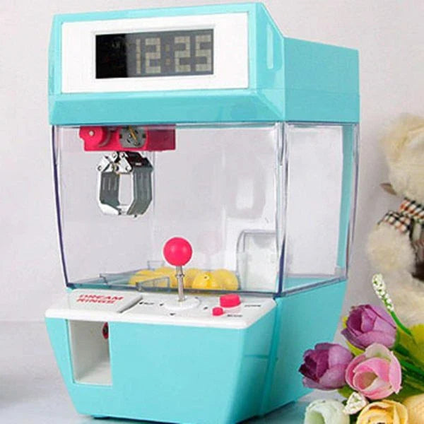 Kiwi-made coin-operated claw machine and alarm clock with precision controls and vibrant LED display