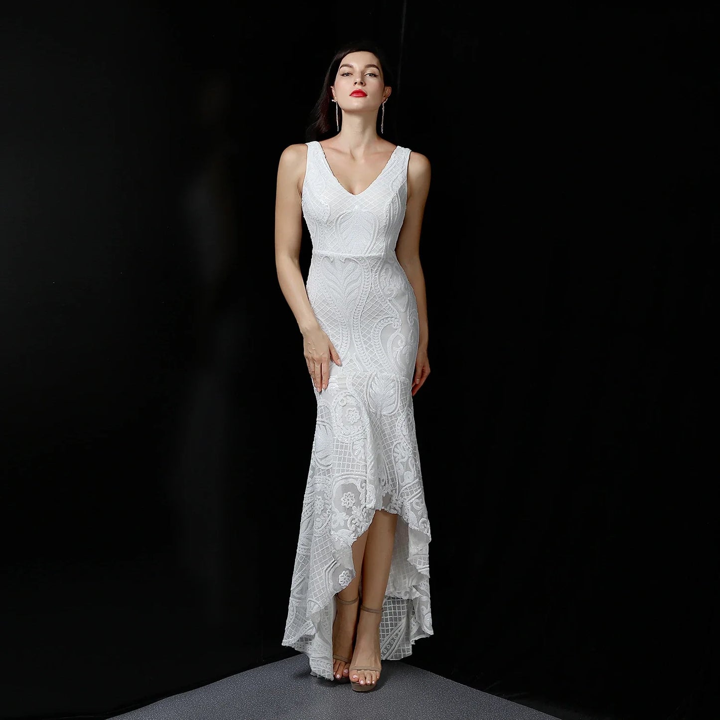 Sophisticated V-neck evening dress in white, black, and gold colours for formal events and parties in New Zealand