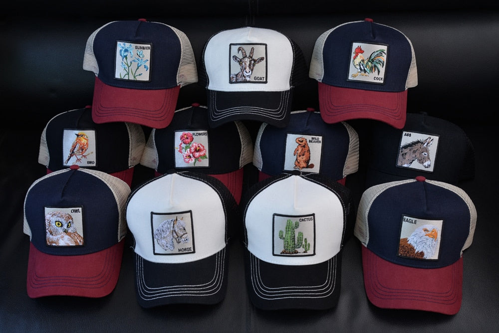 Stylish animal-inspired mesh trucker caps in a variety of designs, including donkeys, roosters, horses, owls, and more