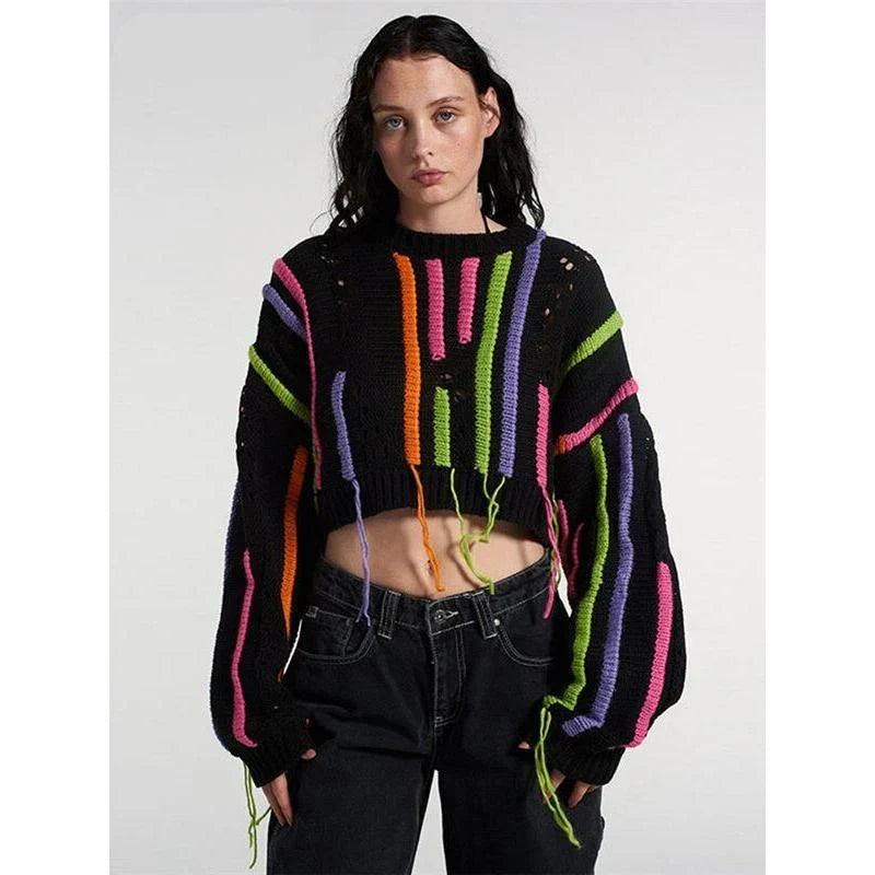 Chic knitted pullover with tassel and patchwork details in a variety of sizes