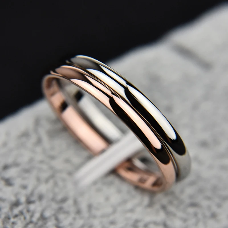 Elegant one-piece unisex ring with a thin 2mm band in four stylish colours: silver, gold, rose gold, and black