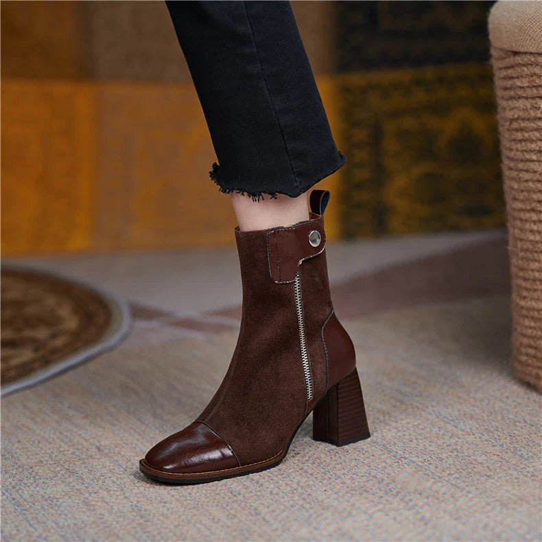 Stylish high-heel Martin boots in brown and black colours, featuring a square toe and side zipper closure for a secure, comfortable fit.