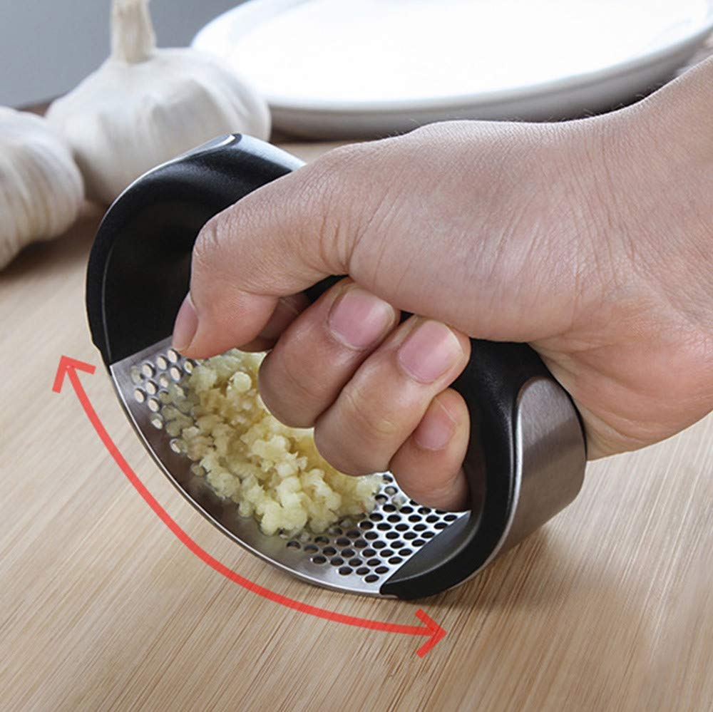 Stainless steel garlic mincer with ergonomic rocking design for quick and easy garlic preparation