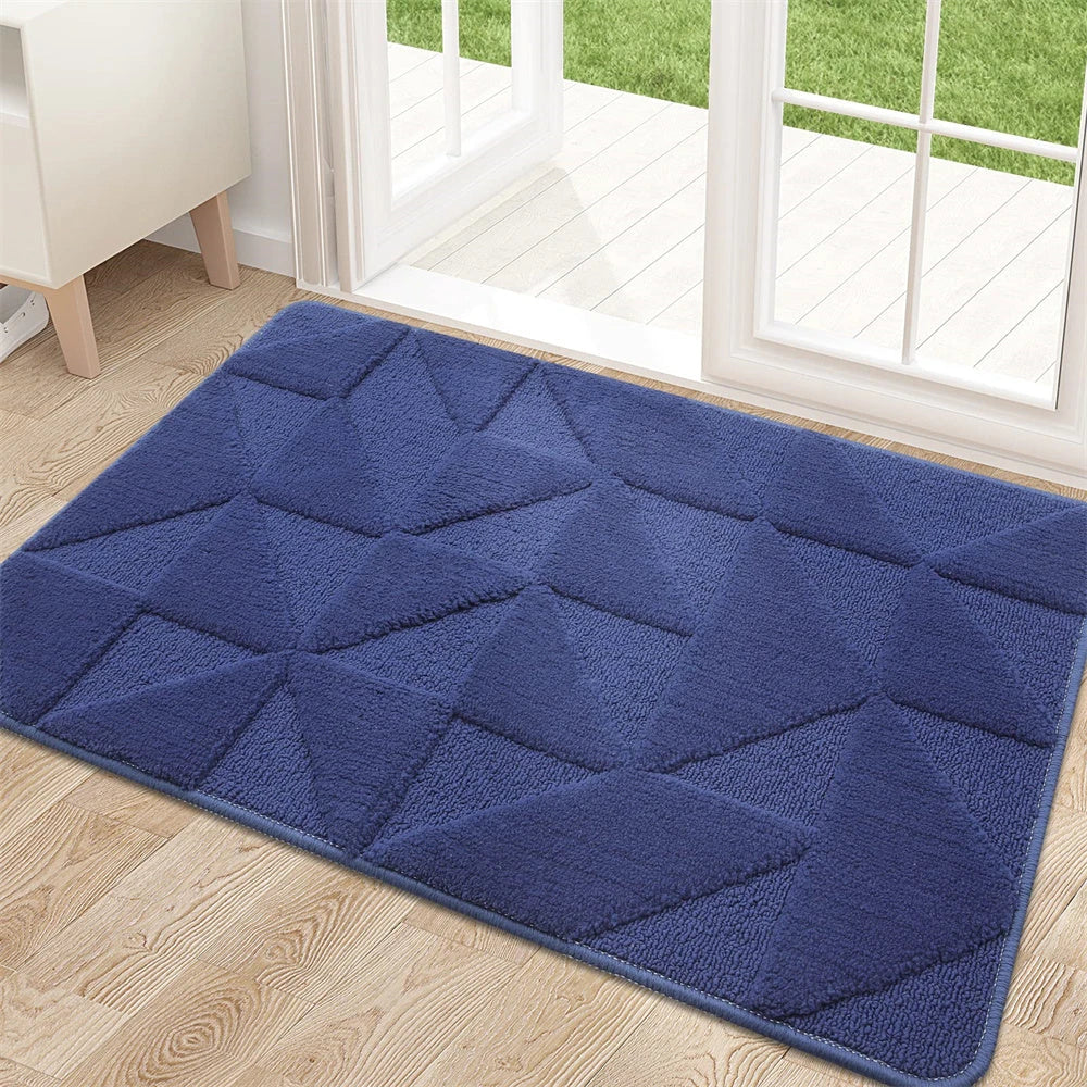Geometric non-slip microfibre door mat in various sizes, featuring an elegant pattern and durable construction for a clean, stylish entryway.
