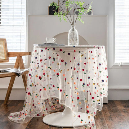 Stylish floral embroidered polyester tablecloth in various sizes, perfect for Kiwi weddings, parties, and home decor