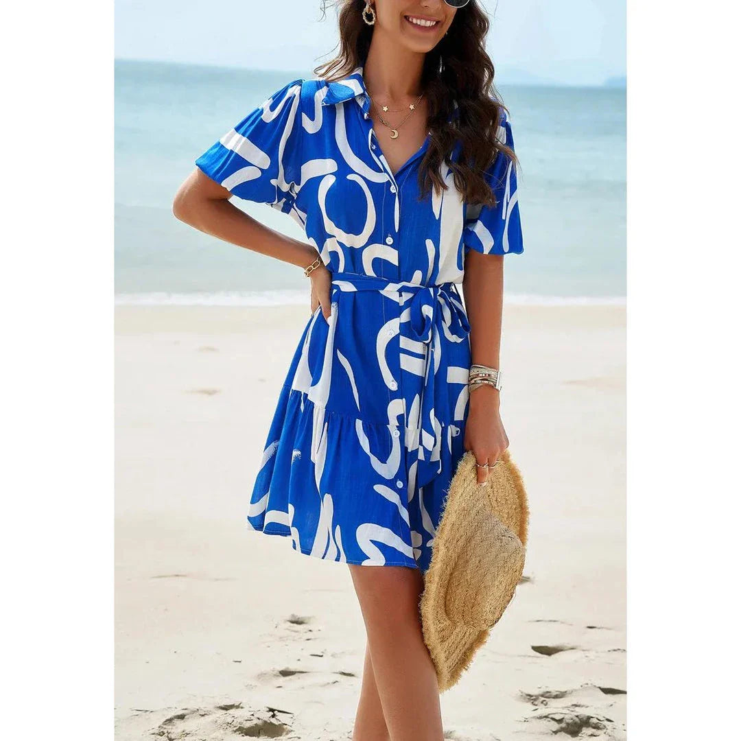 Elegant women's printed dress with short sleeves, ideal for spring and summer in New Zealand