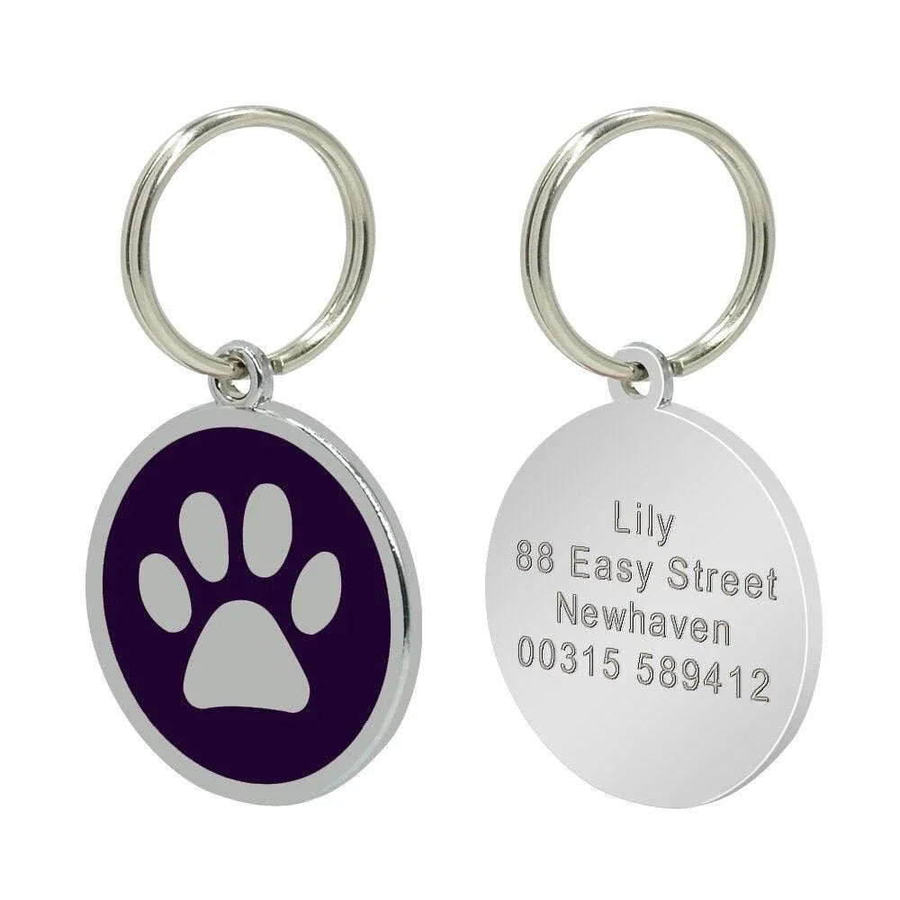 Premium stainless steel dog ID tag with a unique paw print pattern, designed for the active Kiwi lifestyle