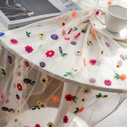 Stylish floral embroidered polyester tablecloth in various sizes, perfect for Kiwi weddings, parties, and home decor