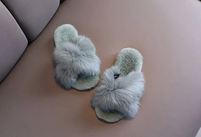 Stylish and comfortable cotton slippers with a unique cross-strap design and an eco-friendly rubber sole, available in a variety of Kiwi-inspired colours.