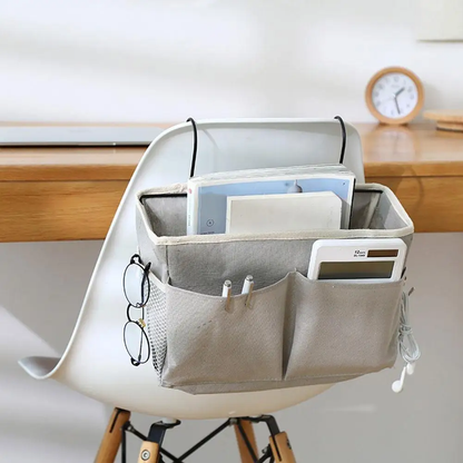 Versatile hanging storage organiser in white and light grey, featuring multiple compartments and hooks for customisable storage in a Kiwi home