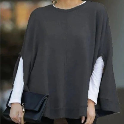 Cosy and relaxed bat-sleeve knit top poncho in a classic plain design, perfect for everyday Kiwi style