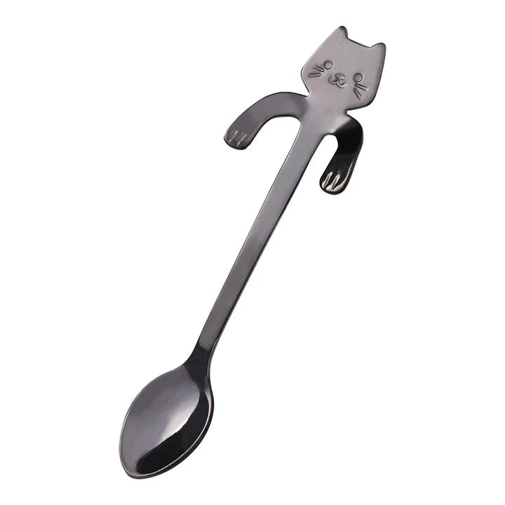 A charming cat-shaped stainless steel teaspoon with a sleek, gold finish, perfect for Kiwi tea and coffee drinkers.