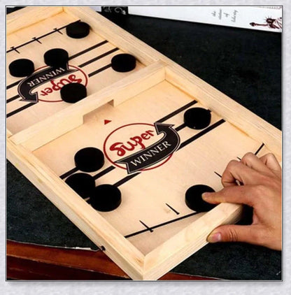 A hand-crafted wooden hockey game with rubber band-powered pucks, perfect for family bonding and screen-free fun in New Zealand