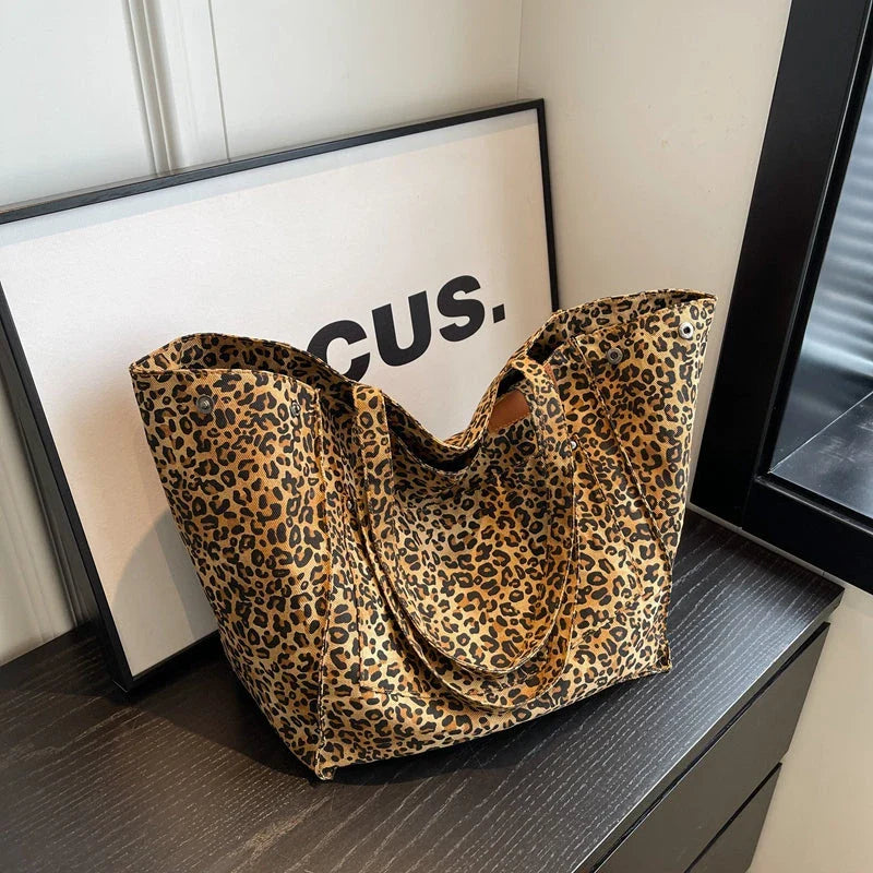 Oversized leopard print canvas shoulder bag with ample storage and stylish design, perfect for Kiwi women
