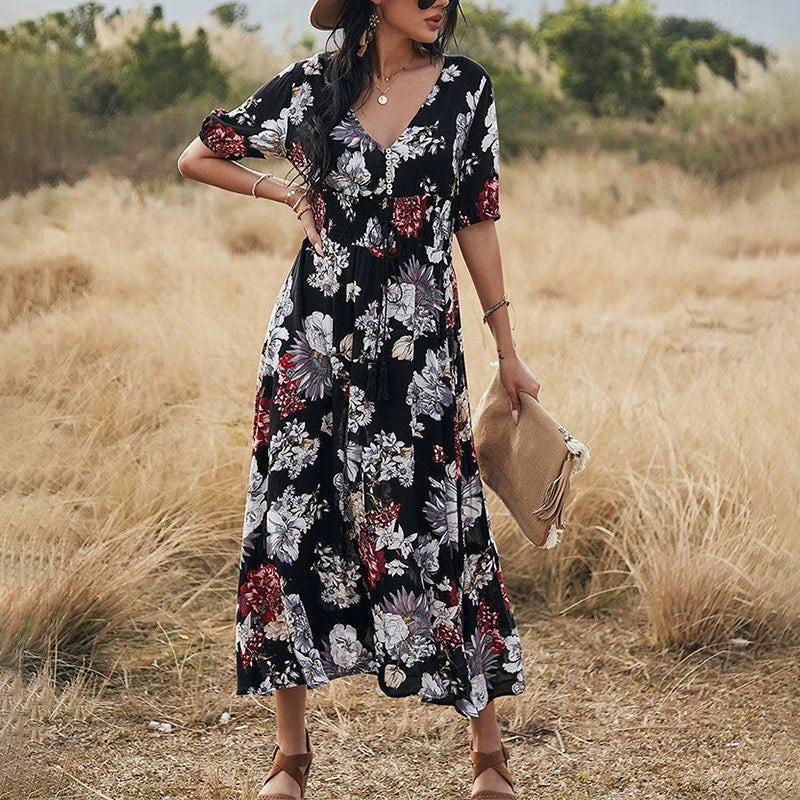 Elegant summer maxi dress with vibrant print, flattering A-line silhouette, and comfortable natural fiber blend