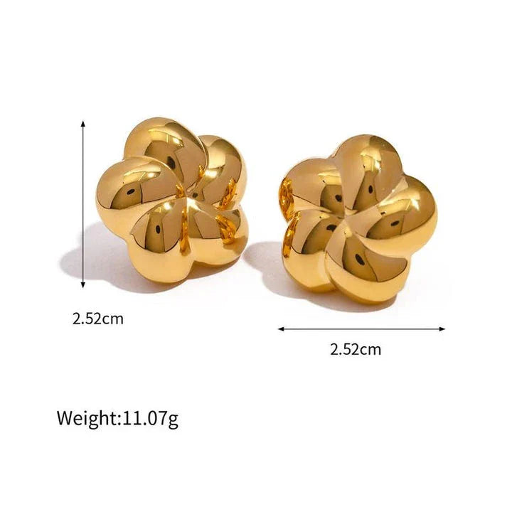 18k gold plated stainless steel flower shaped stud earrings in a silver color