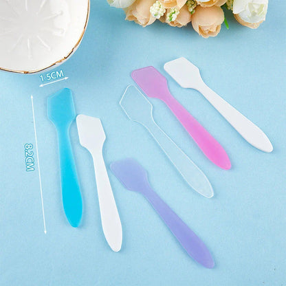 10 Pcs Mini Cosmetic Spatulas in various colours for precise application of face creams and masks