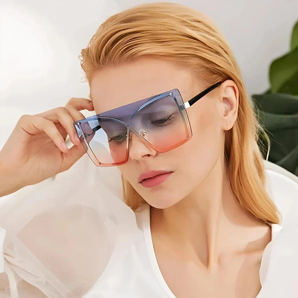 Fashionable Oversized Flat Top Sunglasses with a sleek, rimless design and gradient lenses for style and UV protection