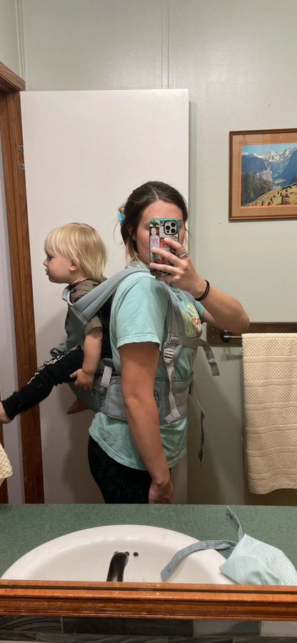 A premium ergonomic baby carrier made with soft, breathable New Zealand cotton for Kiwi parents and their little ones.