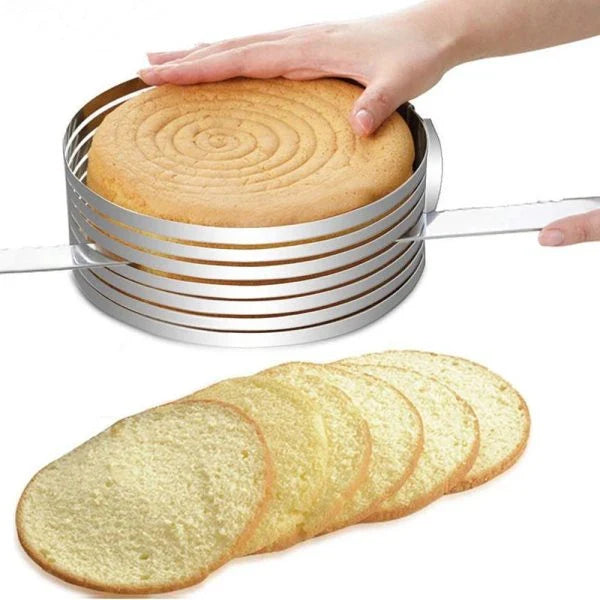 An adjustable stainless steel cake slicer with a ring that can be expanded or shrunk to fit cakes of different sizes, up to 12 inches in diameter.