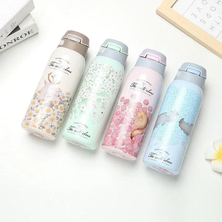 Stylish floral-patterned double-walled water bottle with straw, designed to keep drinks ice-cold for up to 12 hours in the warm New Zealand summer