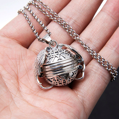 Elegant angel wings photo locket necklace in platinum plating, holds up to 6 cherished photos