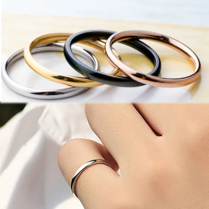 Elegant one-piece unisex ring with a thin 2mm band in four stylish colours: silver, gold, rose gold, and black