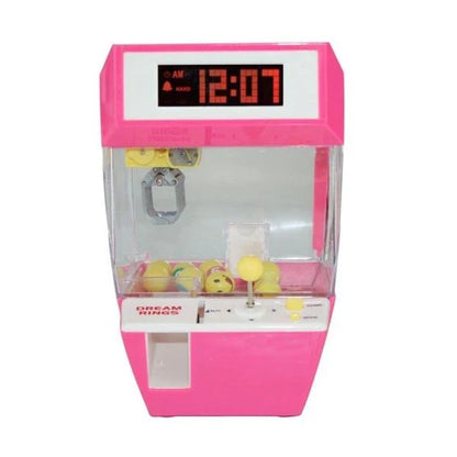 Kiwi-made coin-operated claw machine and alarm clock with precision controls and vibrant LED display